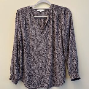 Purple blouse with white flowers.  Elastic sleeve.  Flowy. Never worn! Size S.